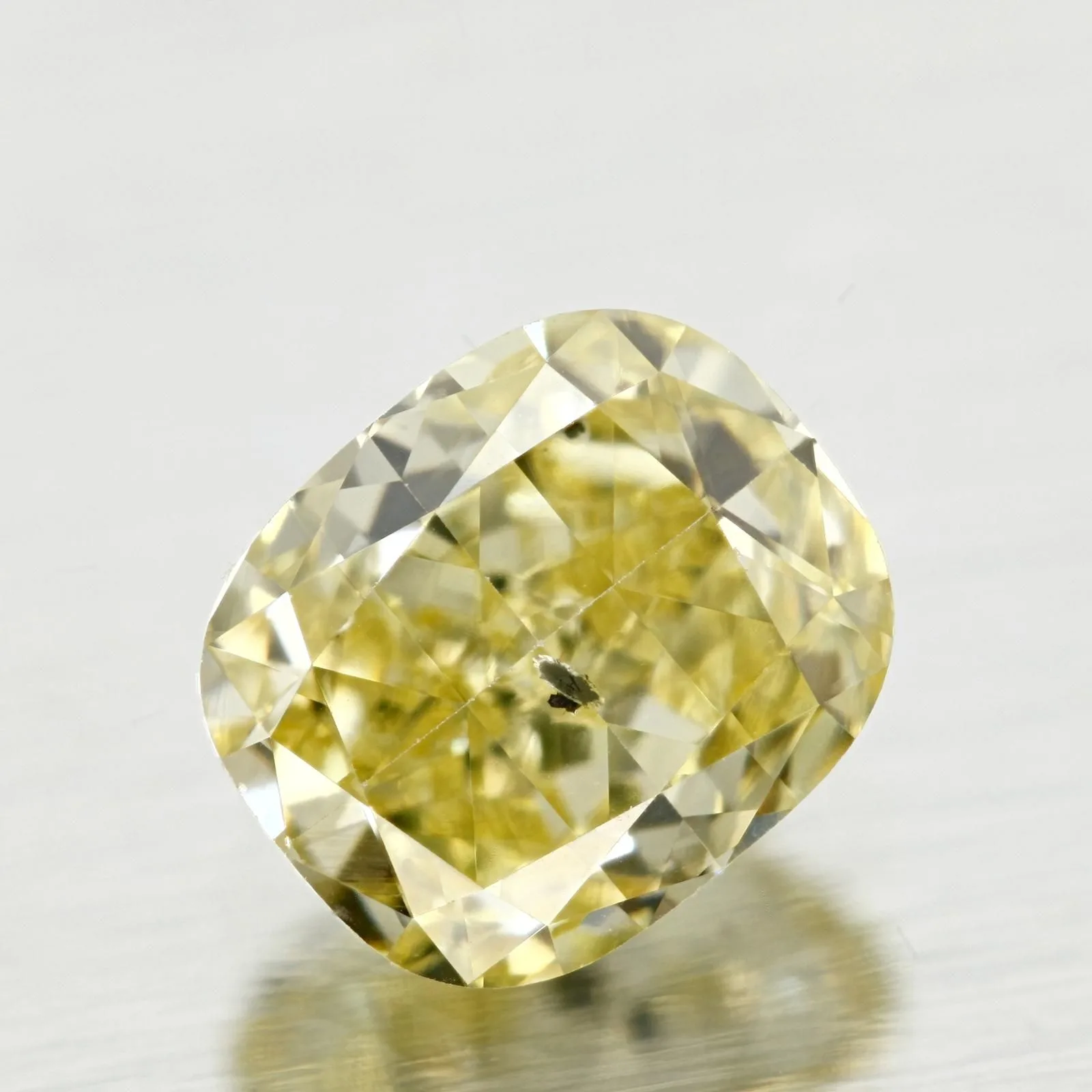 0.7 Carat Cushion Brilliant Fancy Yellow I1 Natural Diamond