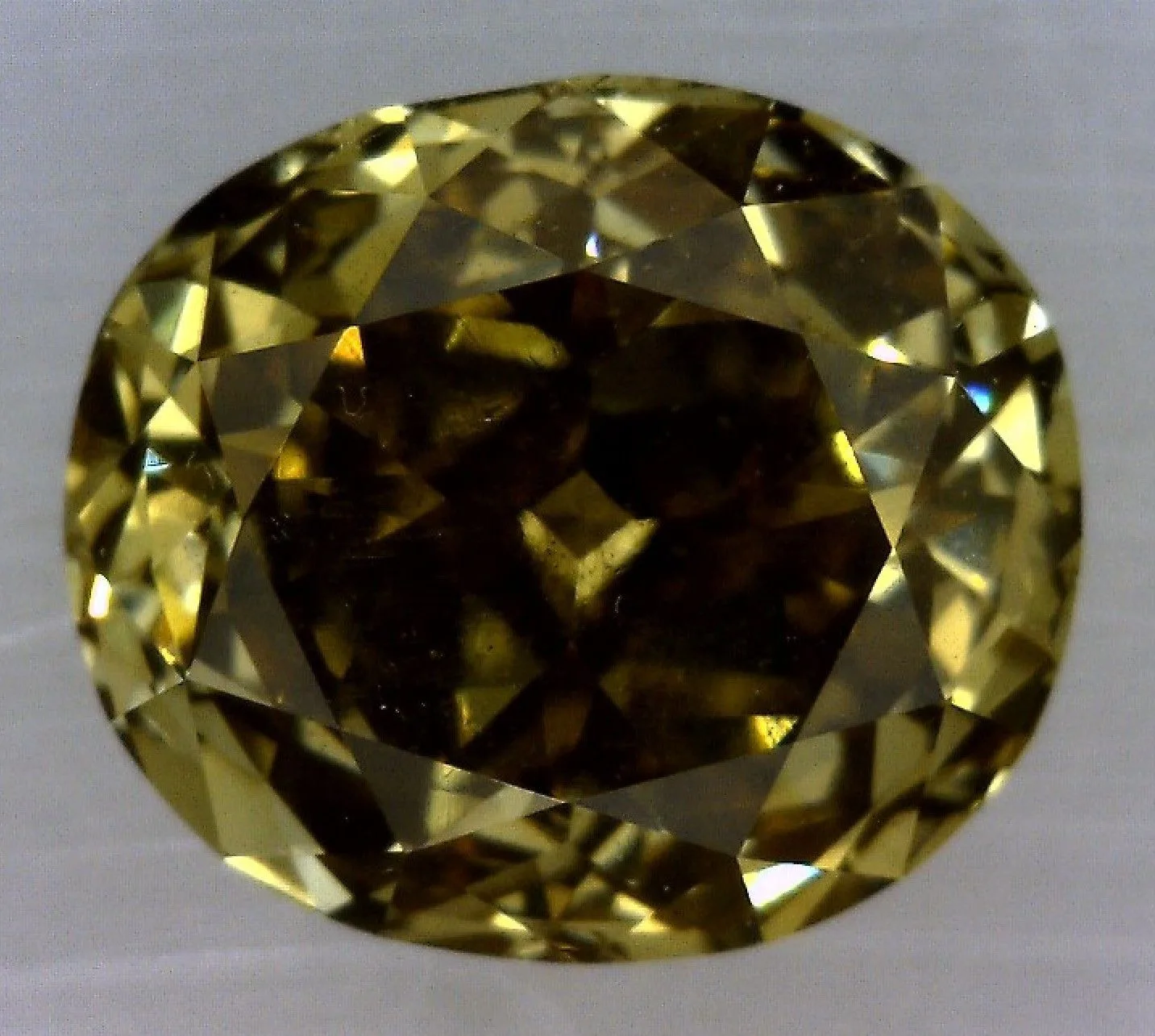 0.68 Carat Oval Fancy Dark Yellow SI2 Natural Diamond 1 0.68 Carat Oval Fancy Dark Yellow SI2 Natural Diamond