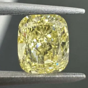 0.9 Carat Cushion Modified Fancy Yellow VS2 Natural Diamond