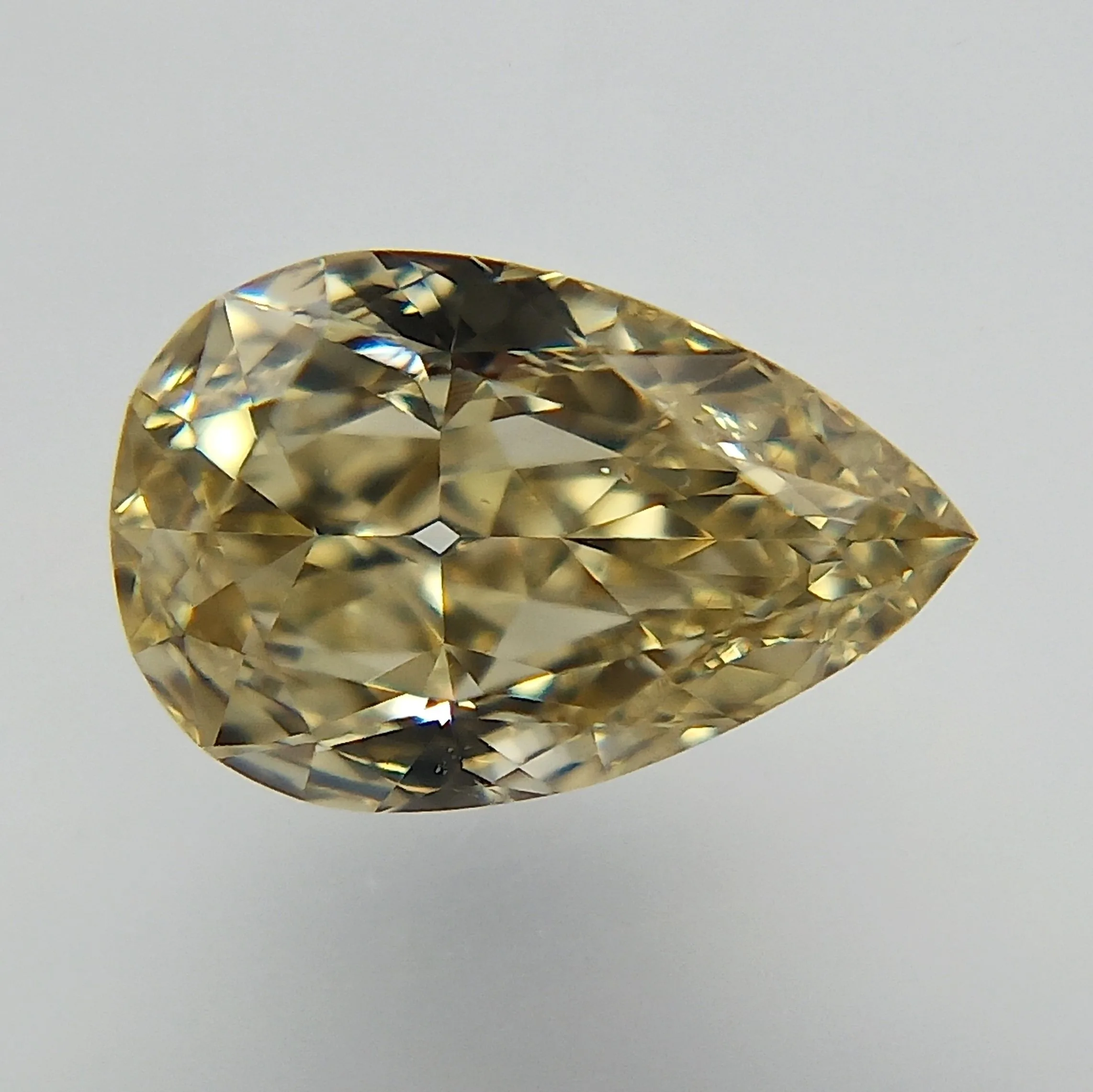 0.31 Carat Pear Fancy Yellow VS2 Natural Diamond