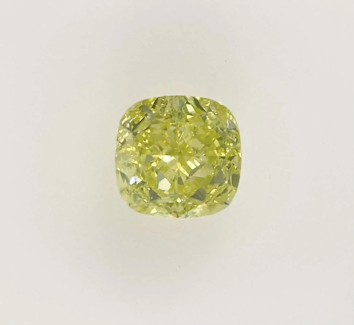 0.77 Carat Cushion Brilliant Fancy Intense Yellow VS1 Natural Diamond 1 0.77 Carat Cushion Brilliant Fancy Intense Yellow VS1 Natural Diamond