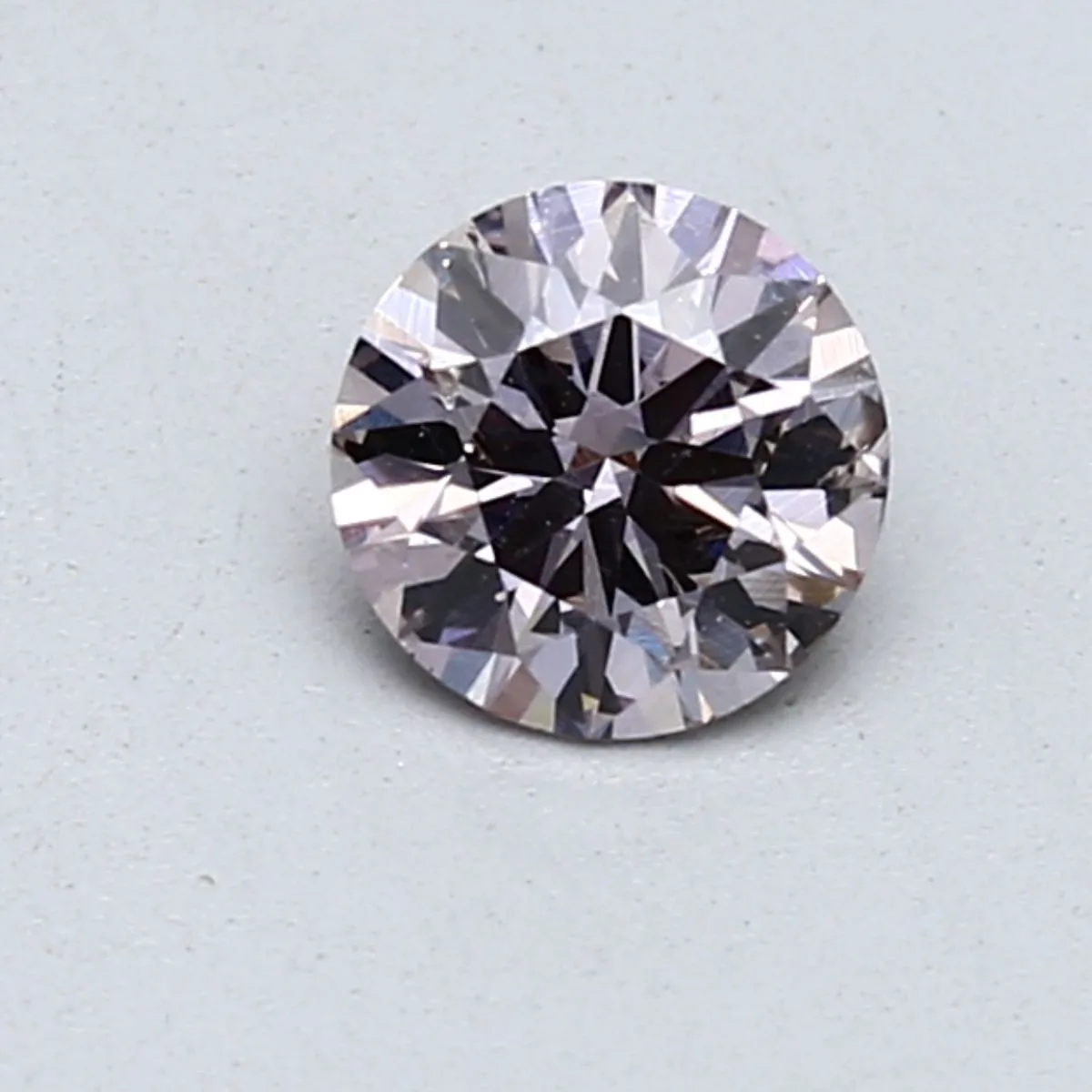 0.59 Carat Round Fancy Brown Purple SI2 Natural Diamond