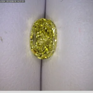 0.79 Carat Fancy Intense  Yellow VVS2 OVAL Diamond