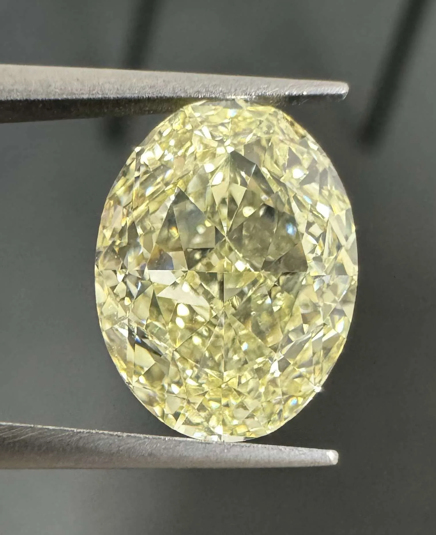 4.02 Carat Oval Fancy Light Yellow VVS2 Natural Diamond 1 4.02 Carat Oval Fancy Light Yellow VVS2 Natural Diamond