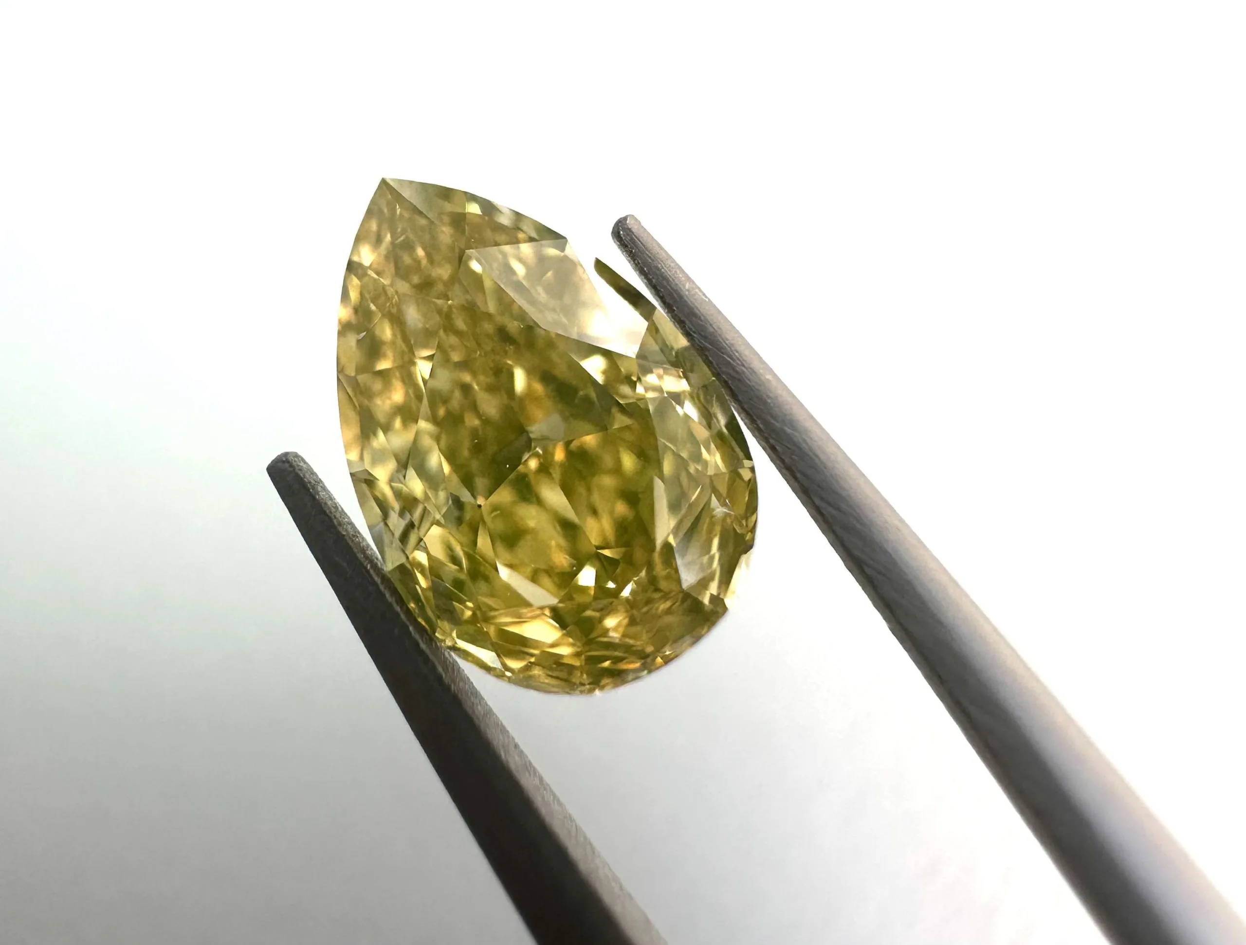 1.03 Carat Pear Fancy Yellow VVS1 Natural Diamond 1 1.03 Carat Pear Fancy Yellow VVS1 Natural Diamond