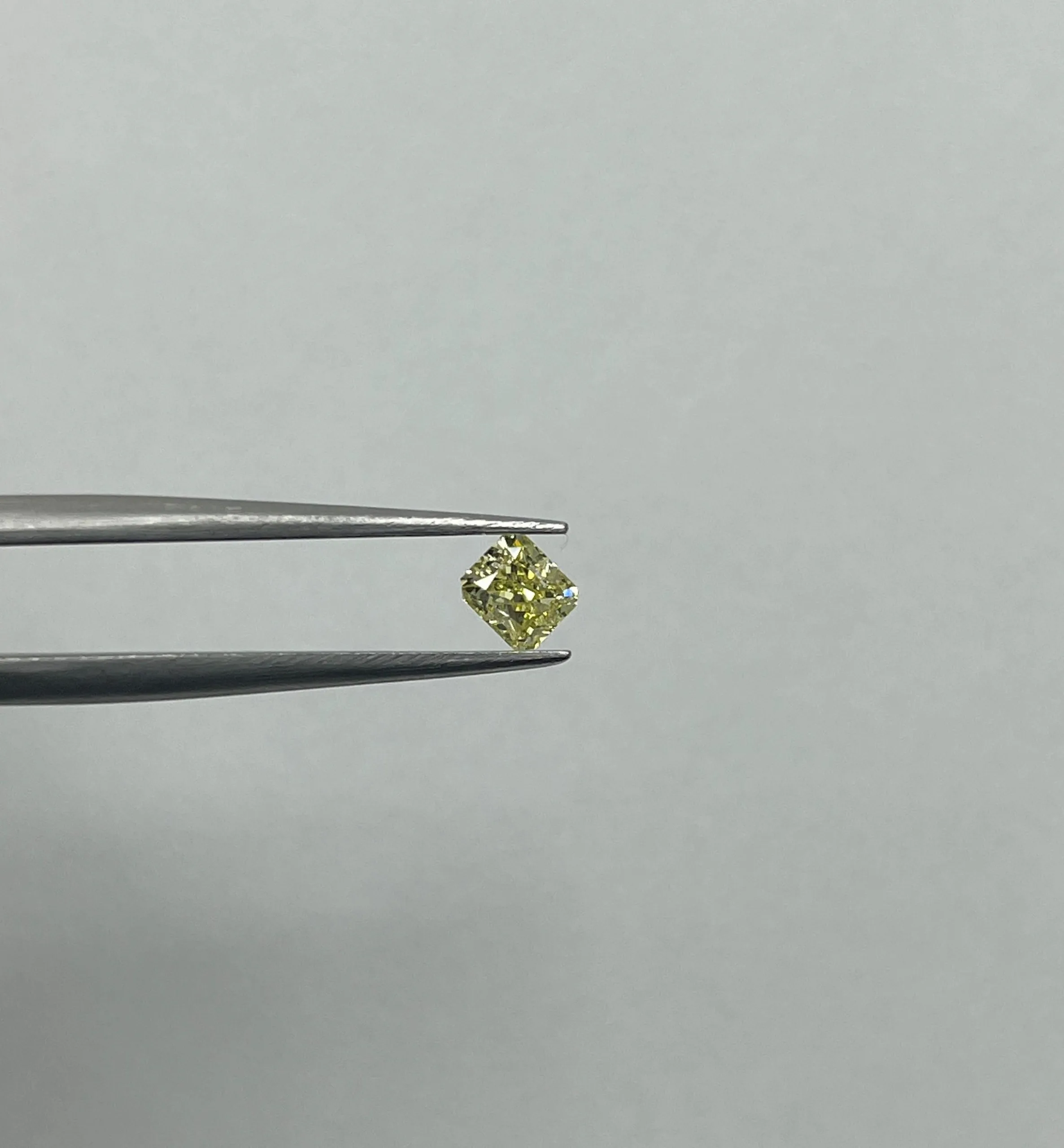 0.51 Carat Radiant Fancy Yellow SI2 Natural Diamond 1 0.51 Carat Cushion Brilliant Fancy Yellow SI2 Natural Diamond