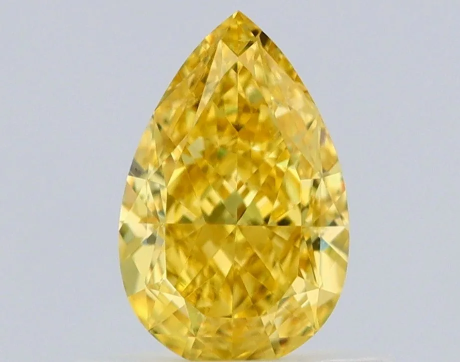0.6 Carat Pear Fancy Vivid Yellow VS2 Natural Diamond 1 0.6 Carat Pear Fancy Vivid Yellow VS2 Natural Diamond