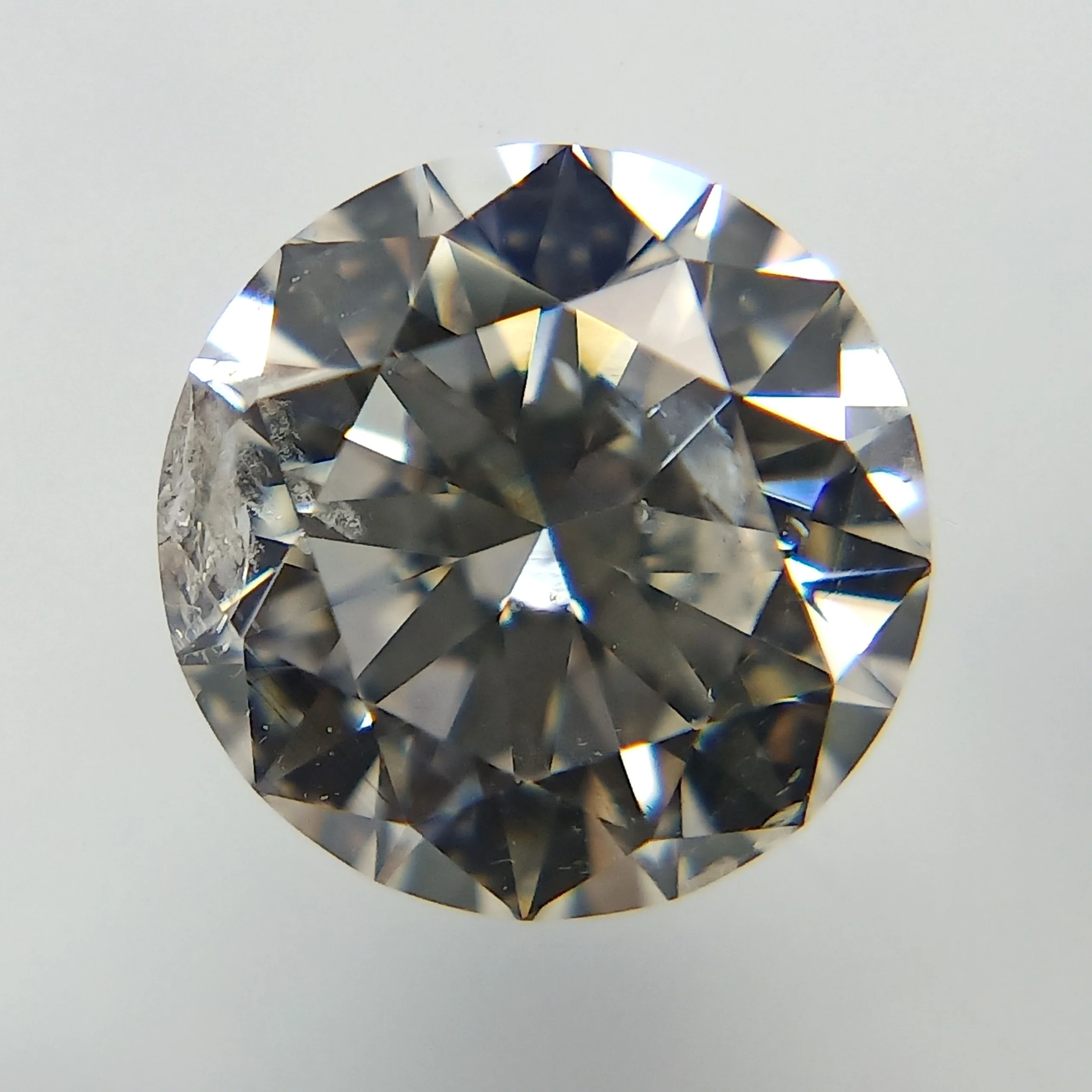 1.02 Carat Round Faint Brown I1 Natural Diamond