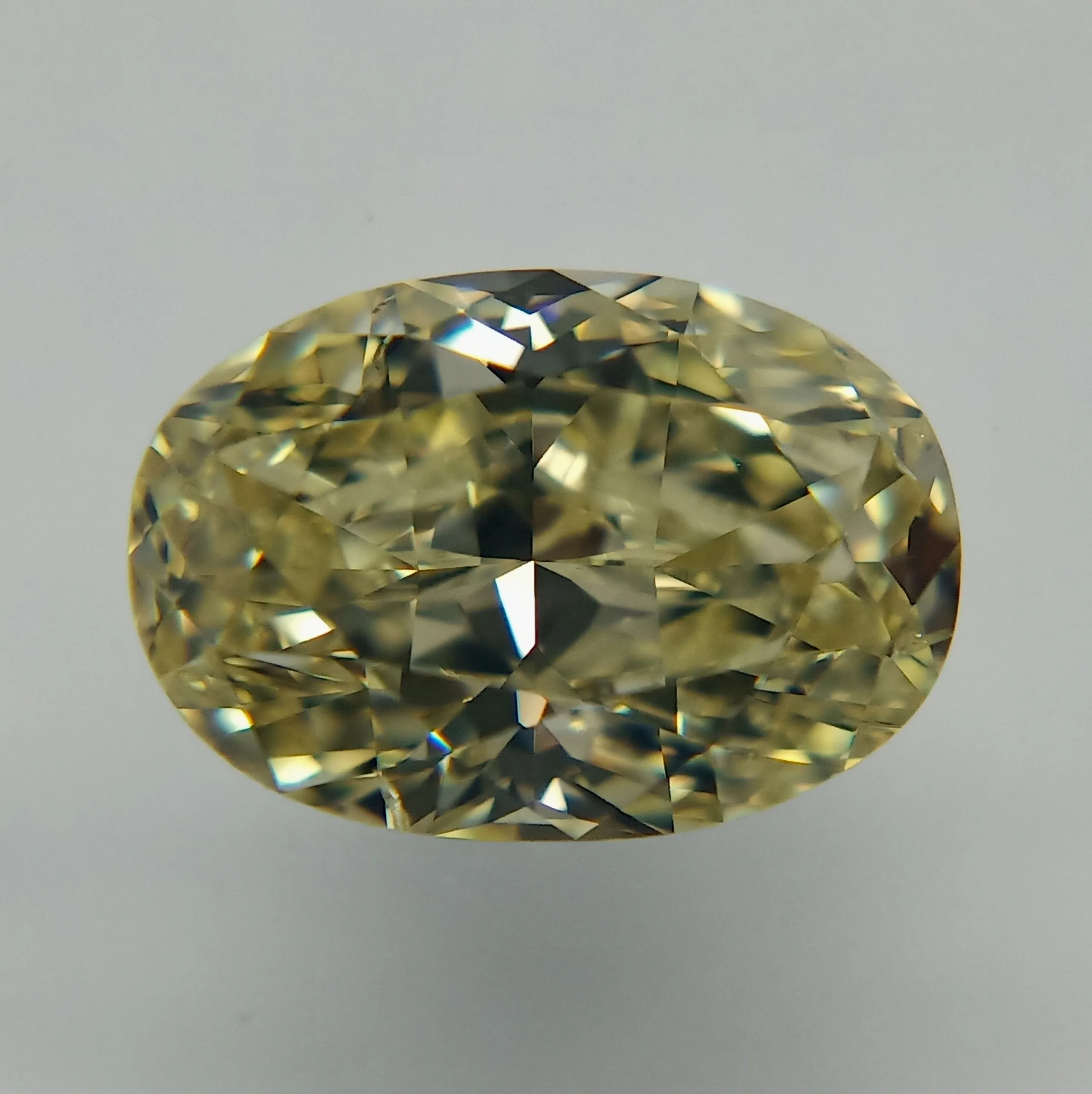 1 Carat Oval Fancy Light Yellow SI2 Natural Diamond