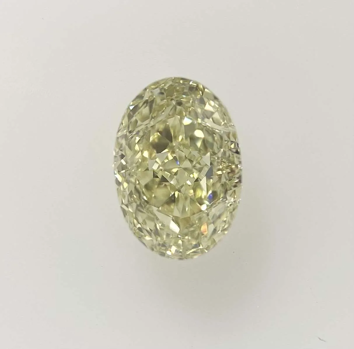 1.2 Carat Oval Fancy Light Yellow VVS2 Natural Diamond 1 1.2 Carat Oval Fancy Light Yellow VVS2 Natural Diamond