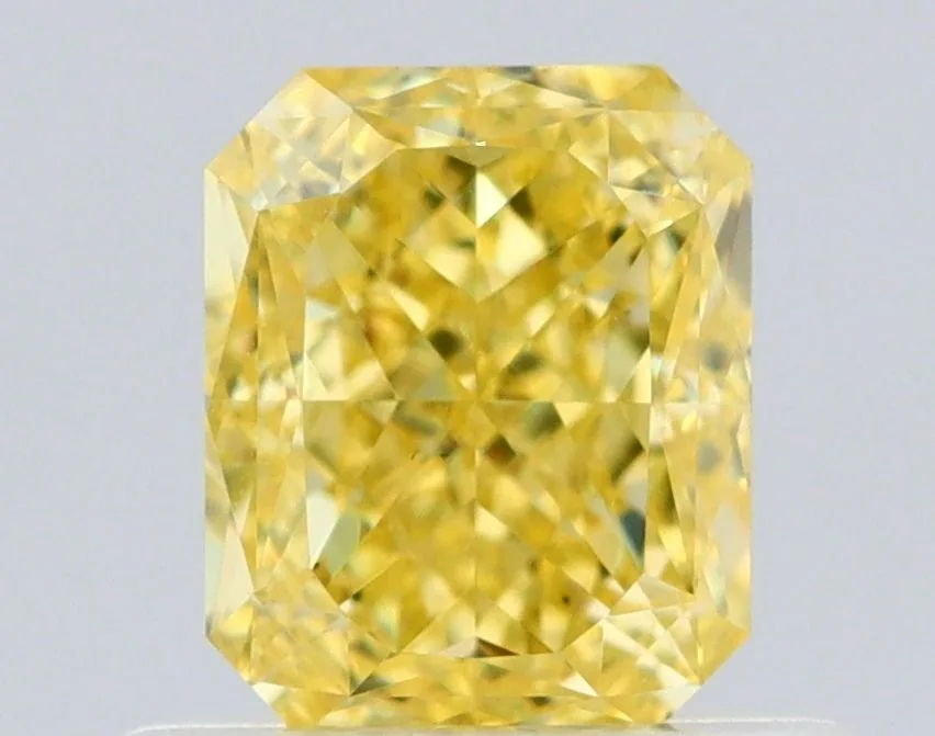 0.7 Carat Radiant Fancy Intense Yellow VS2 Natural Diamond 1 0.7 Carat Radiant Fancy Intense Yellow VS2 Natural Diamond