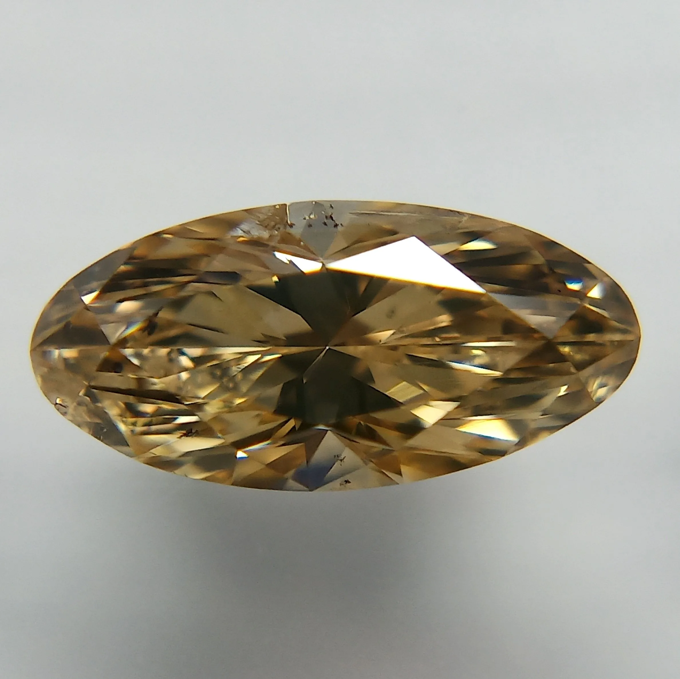 0.7 Carat Oval Fancy Brown Yellow Natural Diamond