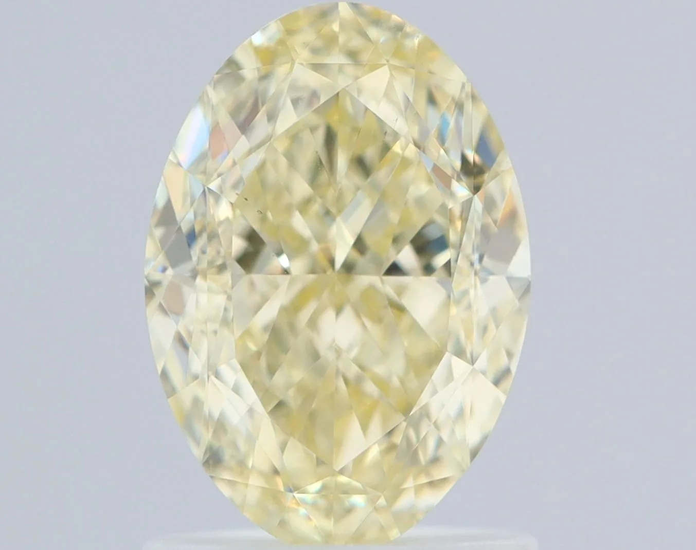1.5 Carat Oval Fancy Light Yellow VS2 Natural Diamond 1 1.5 Carat Oval Fancy Light Yellow VS2 Natural Diamond
