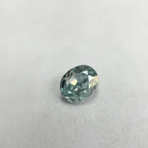 0.18 Carat Oval Fancy Intense Blue Green SI1 Natural Diamond