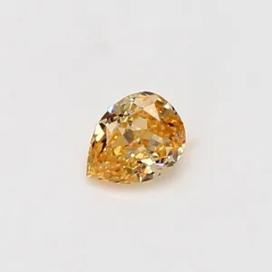 0.22 Carat Pear Fancy Intense Yellow Orange SI2 Natural Diamond