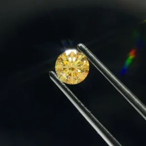 0.69 Carat Round Fancy Yellow VVS2 Lab Diamond