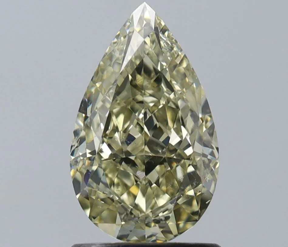 1.51 Carat Pear Fancy Yellow SI1 Natural Diamond 1 1.51 Carat Pear Fancy Yellow SI1 Natural Diamond