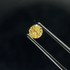0.69 Carat Round Fancy Intense Yellow VVS2 Lab Diamond
