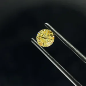 0.7 Carat Round Fancy Intense Yellow VS2 Lab Diamond