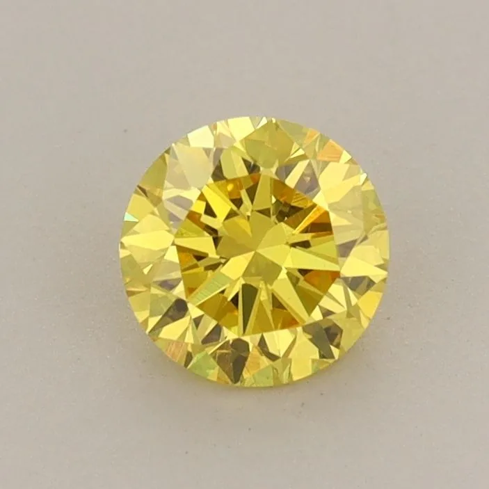 0.58 Carat Round Fancy Vivid Yellow VS2 Lab Diamond 1 0.58 Carat Round Fancy Vivid Yellow VS2 Lab Diamond