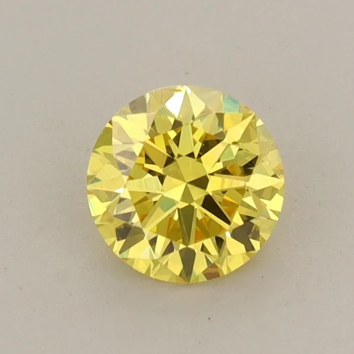 0.59 Carat Round Fancy Vivid Yellow VS2 Lab Diamond 1 0.59 Carat Round Fancy Vivid Yellow VS2 Lab Diamond
