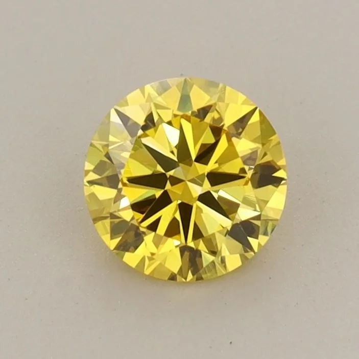 0.6 Carat Round Fancy Vivid Yellow VVS2 Lab Diamond 1 0.6 Carat Round Fancy Vivid Yellow VVS2 Lab Diamond