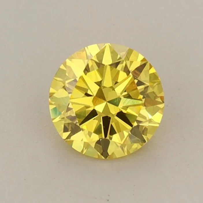 0.61 Carat Round Fancy Vivid Yellow VS1 Lab Diamond 1 0.61 Carat Round Fancy Vivid Yellow VS1 Lab Diamond