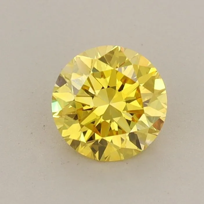 0.63 Carat Round Fancy Vivid Yellow VS1 Lab Diamond 1 0.63 Carat Round Fancy Vivid Yellow VS1 Lab Diamond