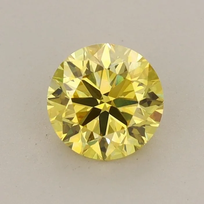 0.66 Carat Round Fancy Vivid Yellow VVS2 Lab Diamond 1 0.66 Carat Round Fancy Vivid Yellow VVS2 Lab Diamond