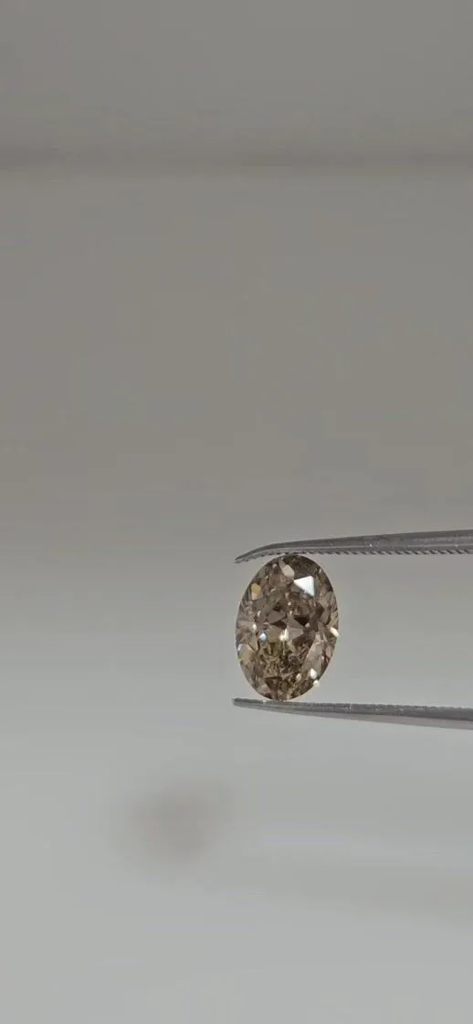 0.96 Carat Oval Fancy Brown Yellow VS2 Natural Diamond 1 0.96 Carat Oval Fancy Brown Yellow VS2 Natural Diamond