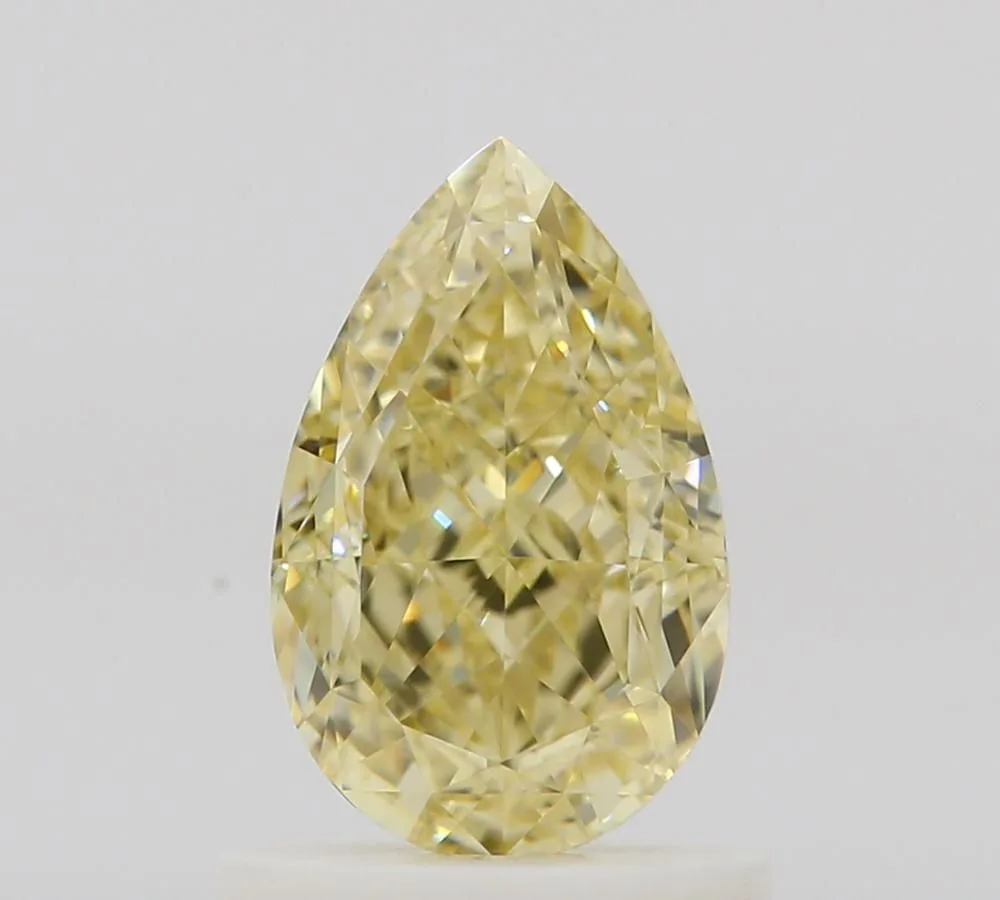 1.02 Carat Pear Fancy Yellow VVS1 Natural Diamond 1 1.02 Carat Pear Fancy Yellow VVS1 Natural Diamond