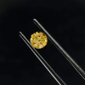 0.76 Carat Round Fancy Intense Yellow VVS2 Lab Diamond