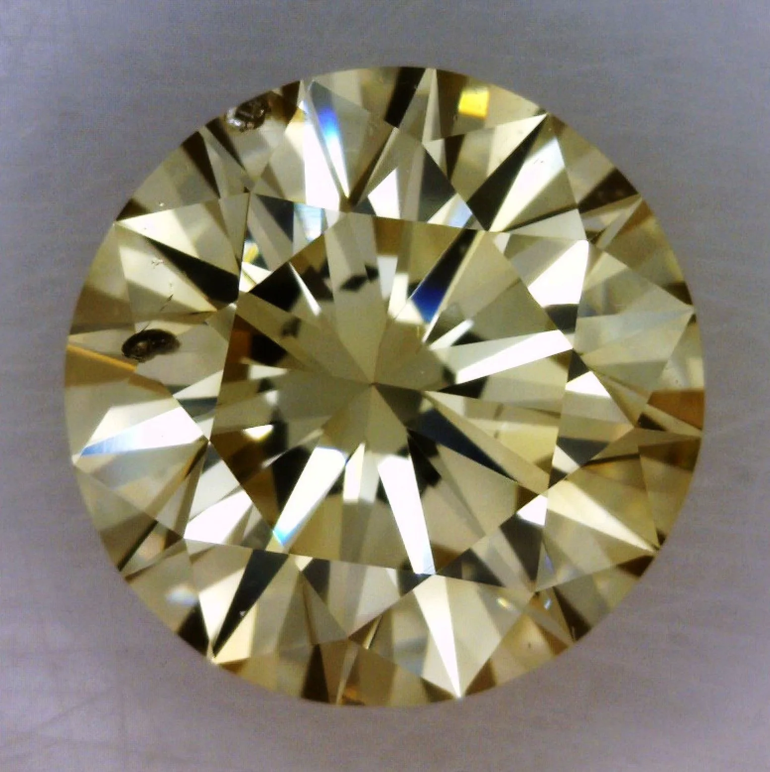 0.97 Carat Round Fancy Light Yellow SI2 Natural Diamond 1 0.97 Carat Round Fancy Light Yellow SI2 Natural Diamond
